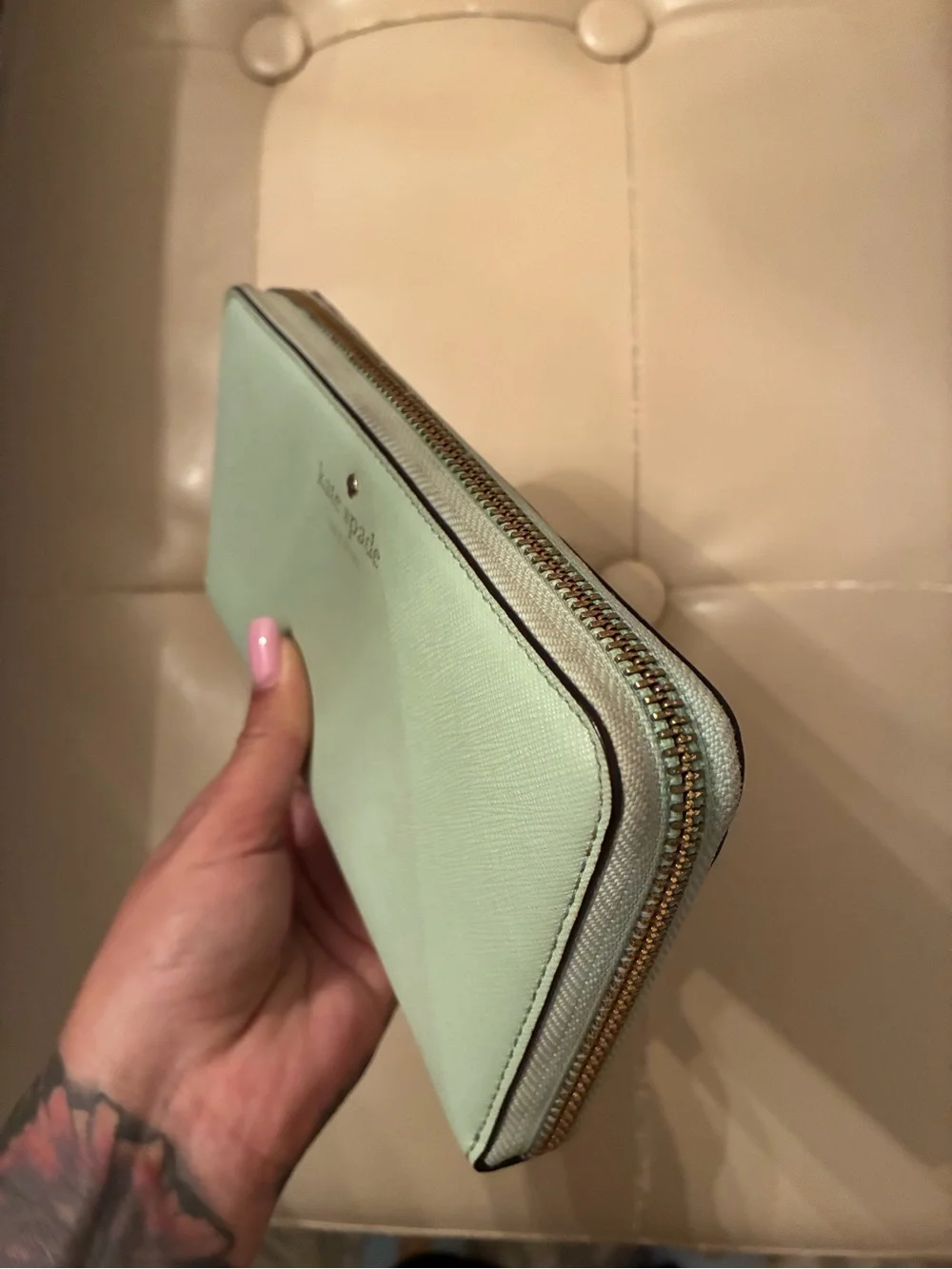 kate spade mint green zip-around leather wallet with gold logo
